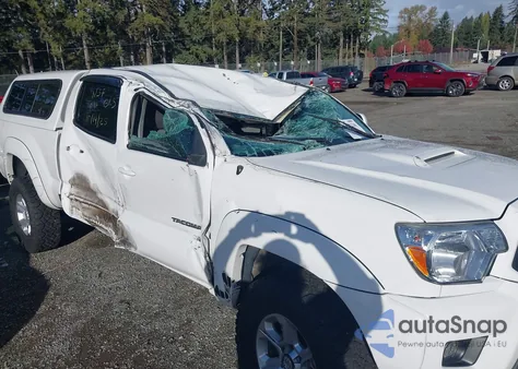 2015 Toyota Tacoma Base V6 z USA, uszkodzony, nr VIN 3TMMU4FN4FM077170